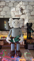 Kaws Money Counting Statue | Unique Collectible Art Piece for Home Decor & Gift Idea | Modern Style Sculpture