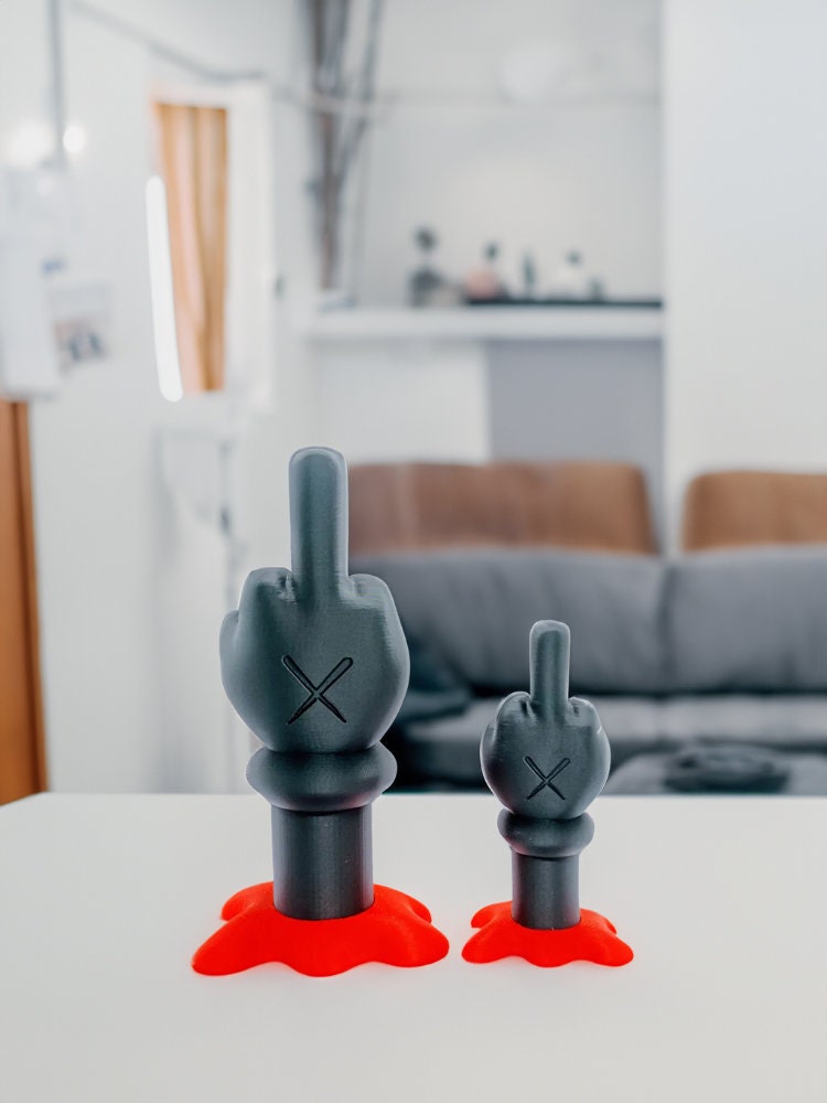 KAWS Middle Finger