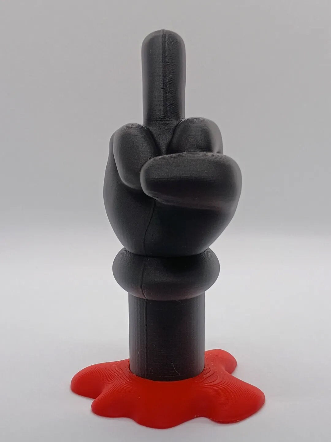 KAWS Middle Finger